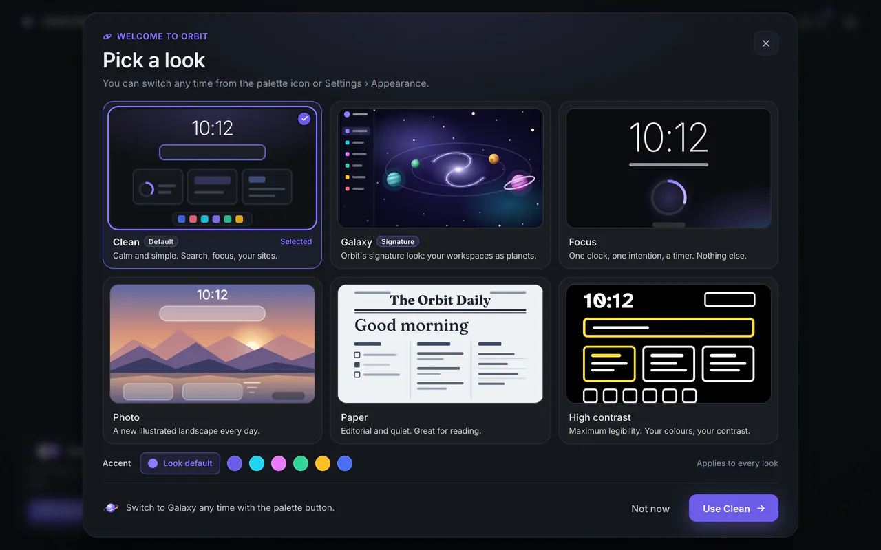 The Pick a look sheet: six cards for Clean (selected, marked Default), Galaxy (marked Signature), Focus, Photo, Paper and High contrast, an accent color row, and Not now and Use Clean buttons.
